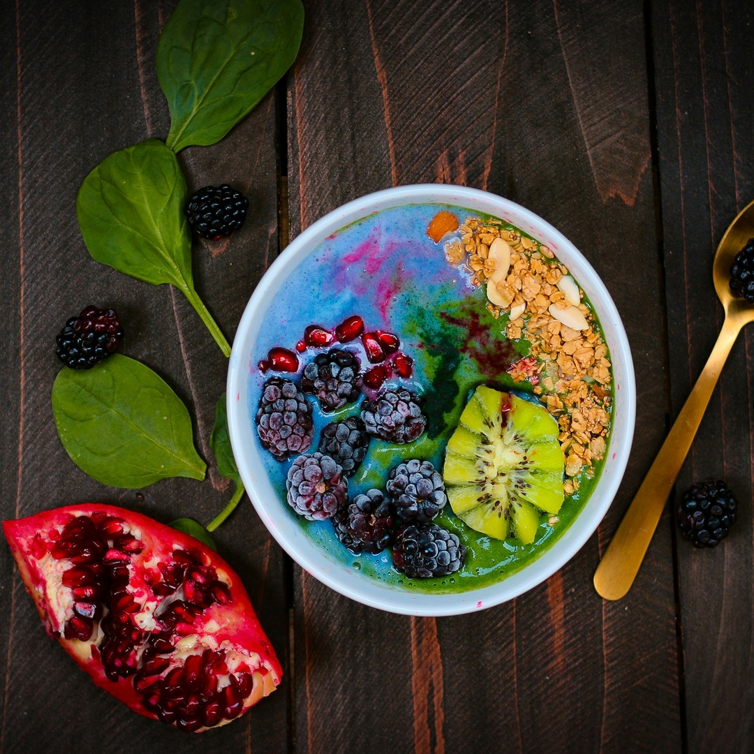 Colorful fruits and granola bowl